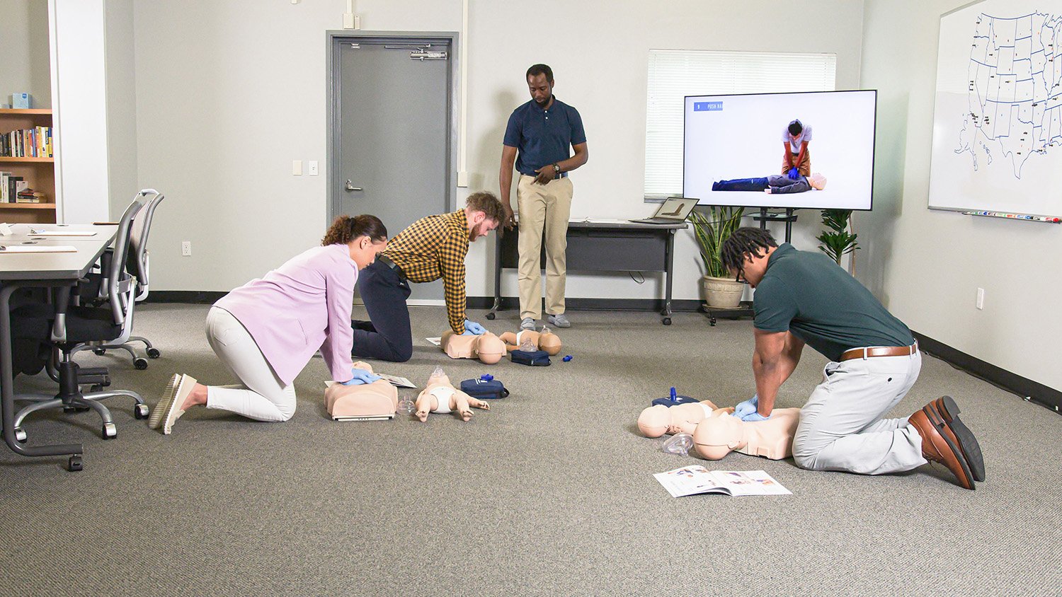 CPR group training with Instructor